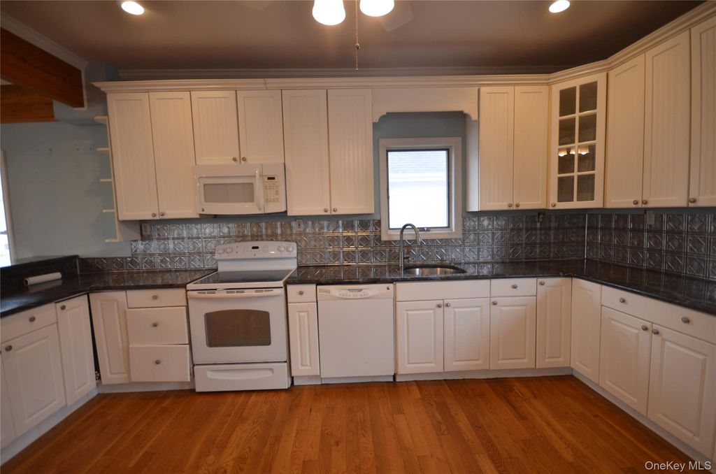 Photo of 138 Beach Avenue, Bellmore, NY 11710 (MLS # 943937)