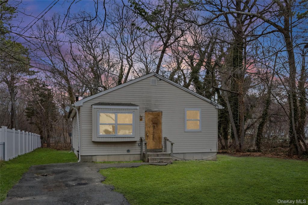 Photo of 85 Norfleet Lane, Coram, NY 11727 (MLS # 980197)