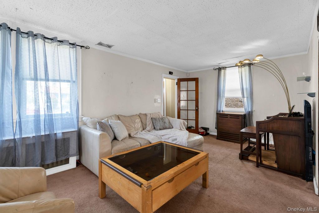 Photo of 219-34 114th Avenue, Cambria Heights, NY 11411 (MLS # 993443)
