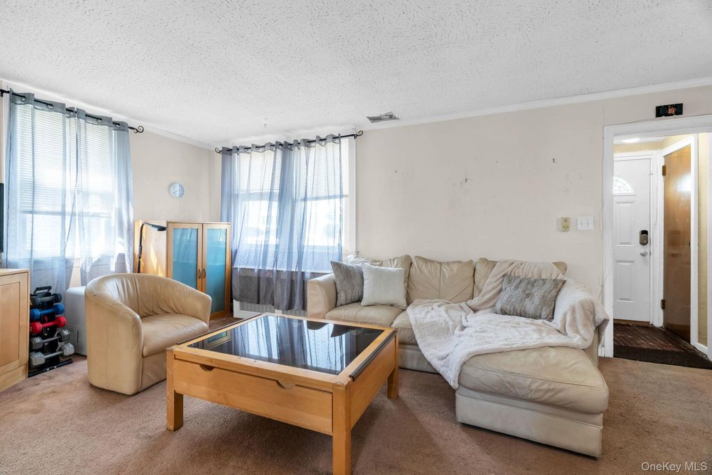 Photo of 219-34 114th Avenue, Cambria Heights, NY 11411 (MLS # 993443)