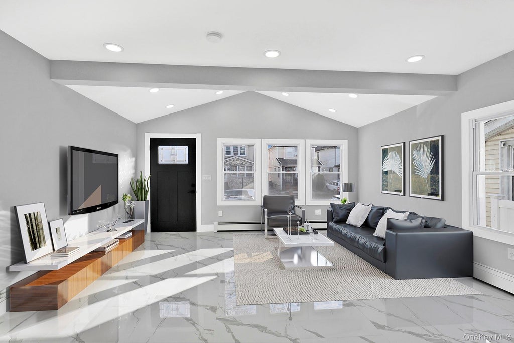 Photo of 109-20 221st Street, Queens Village, NY 11429 (MLS # 1043386)