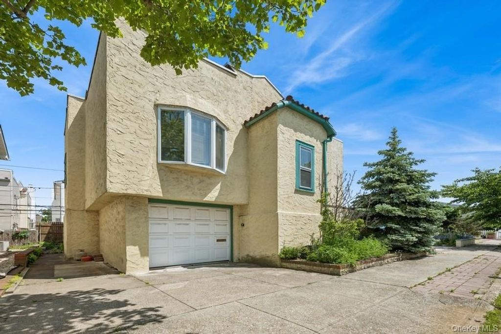 Photo of 128 Belmont Avenue, Long Beach, NY 11561 (MLS # 959998)