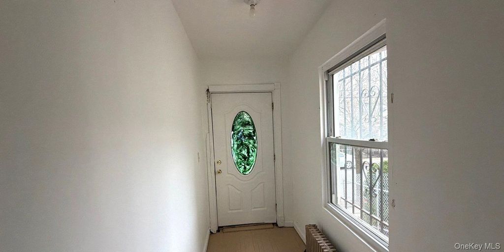 Photo of 150-81 116th Drive, Jamaica South, NY 11434 (MLS # 980073)