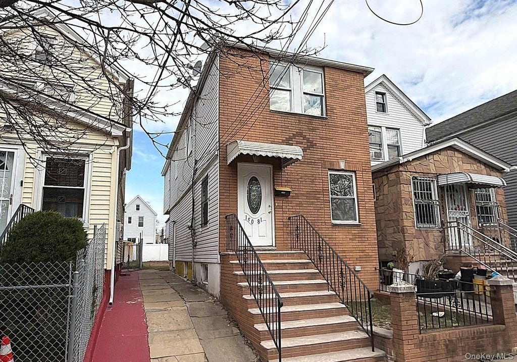 Photo of 150-81 116th Drive, Jamaica South, NY 11434 (MLS # 980073)