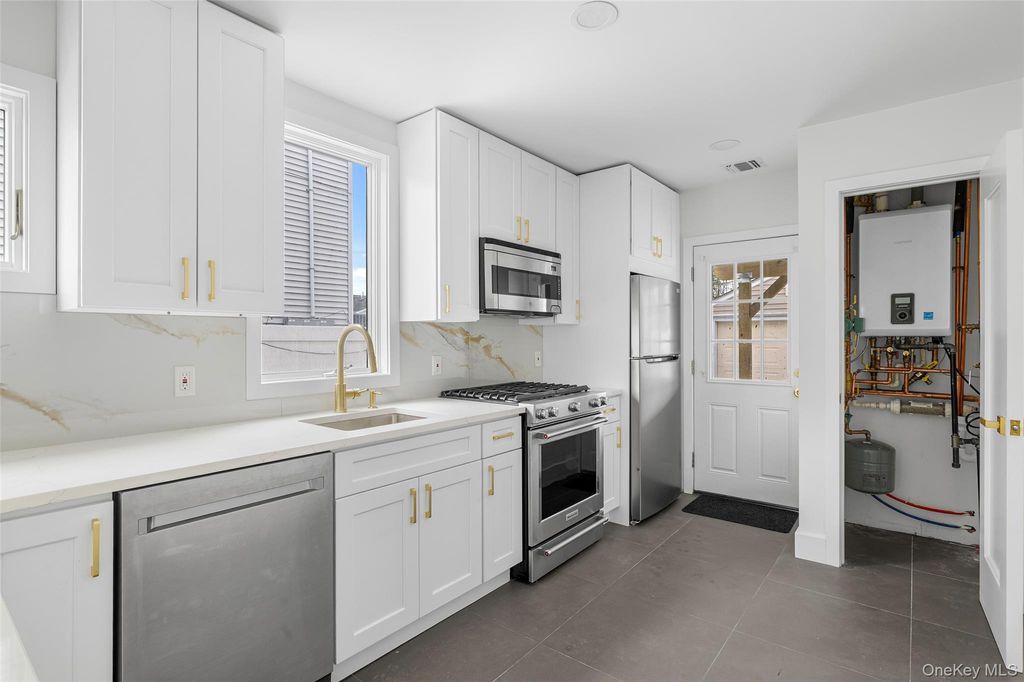 Photo of 36 Kildare Road, Island Park, NY 11558 (MLS # 971606)