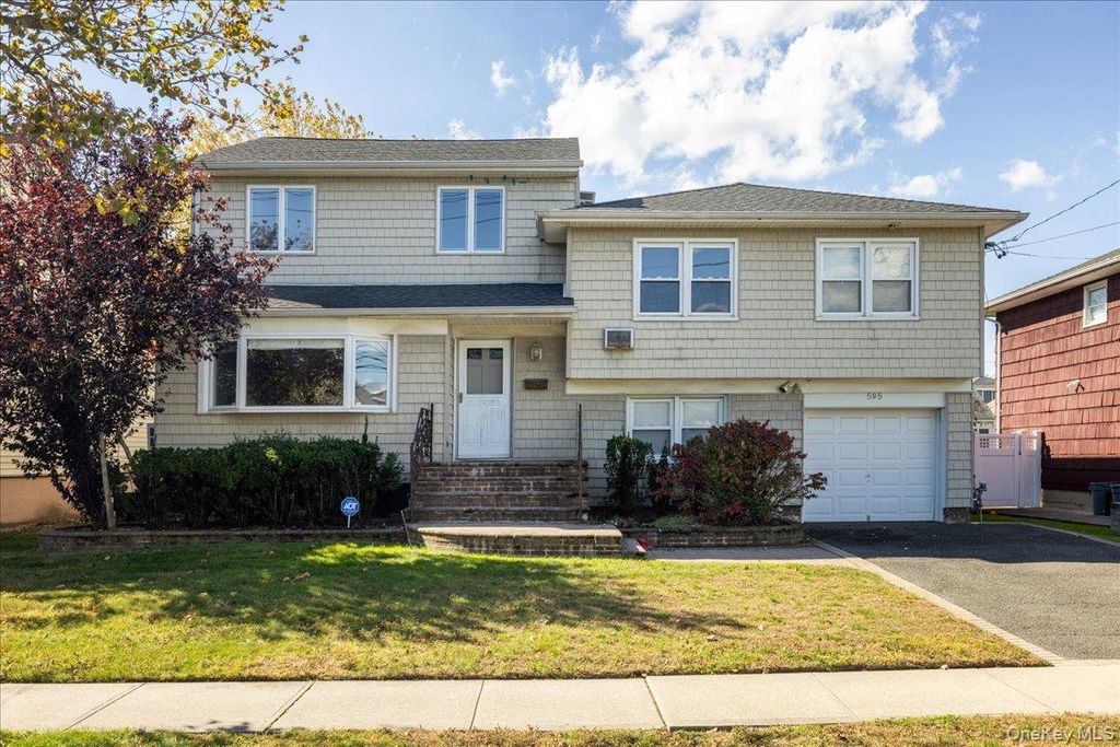 Photo of 595 Church Avenue, Woodmere, NY 11598 (MLS # 959178)