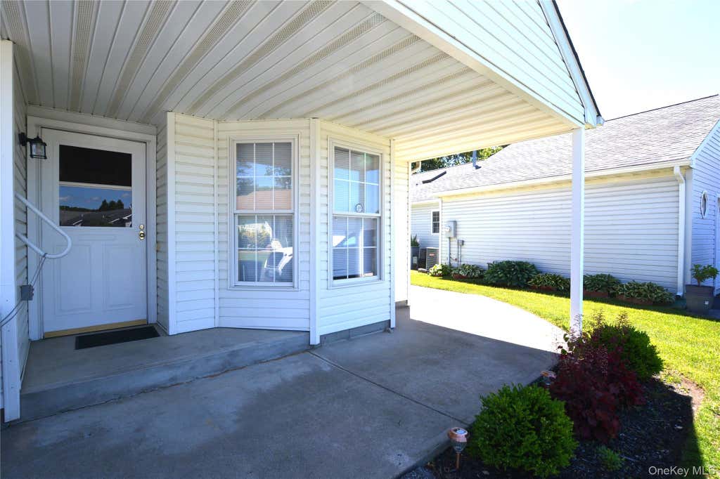 Photo of 5190 Village Circle E, Manorville, NY 11949 (MLS # 1017275)
