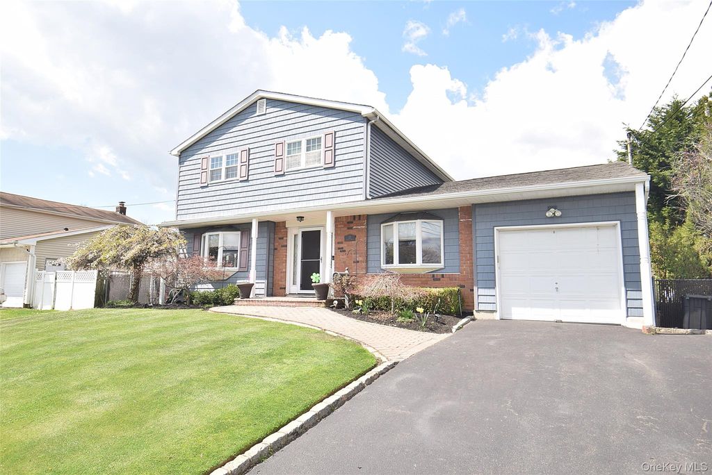 Photo of 32 Lagoon Place, East Islip, NY 11730 (MLS # 987840)
