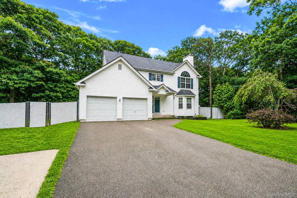 Photo of 133 Cumberland Street, Mastic, NY 11950 (MLS # 1034766)
