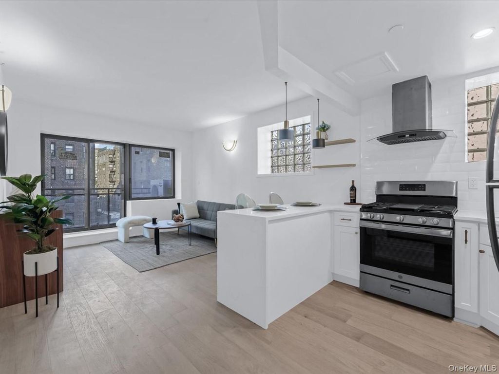 Photo of 97-30 64 ave Rd, Rego Park, NY 11374 (MLS # 963512)