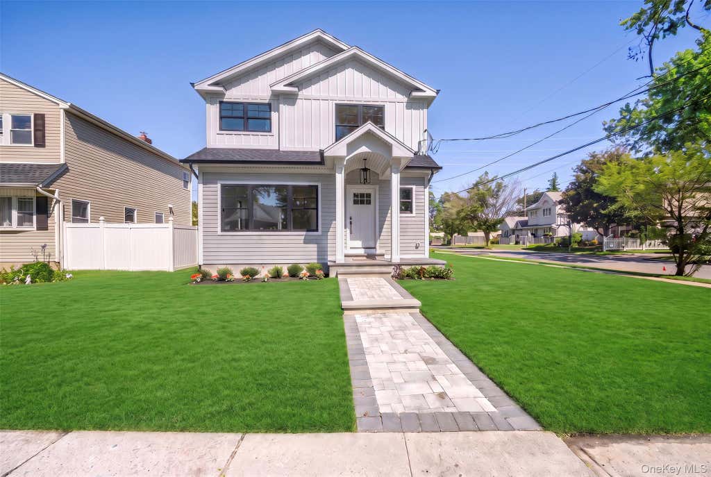 Photo of 97 Broadmoor Lane, Westbury, NY 11590 (MLS # 1042404)