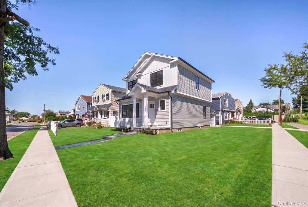 Photo of 97 Broadmoor Lane, Westbury, NY 11590 (MLS # 1042404)