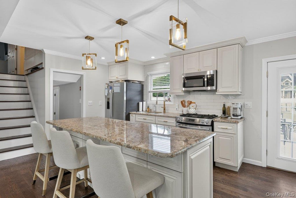 Photo of 61 Carleton Avenue, Amityville, NY 11701 (MLS # 1048520)