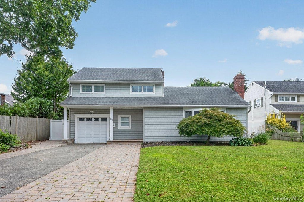 Photo of 61 Carleton Avenue, Amityville, NY 11701 (MLS # 1048520)