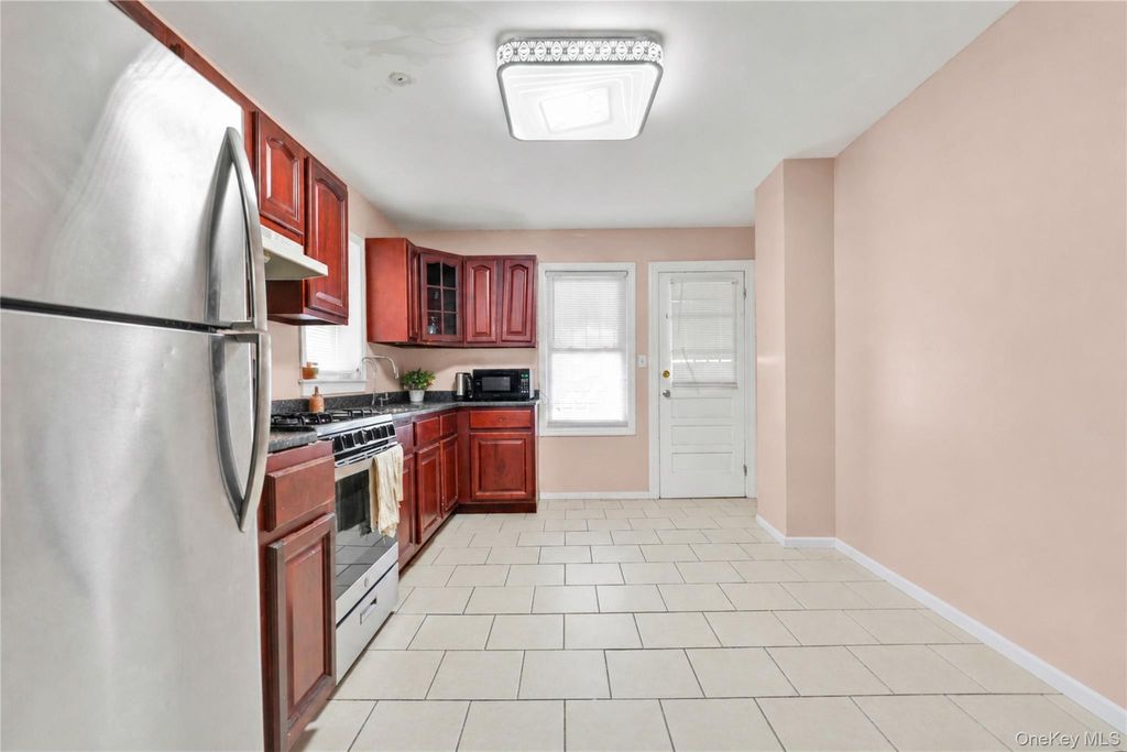 Photo of 11533 146th Street, Jamaica, NY 11436 (MLS # 1006848)