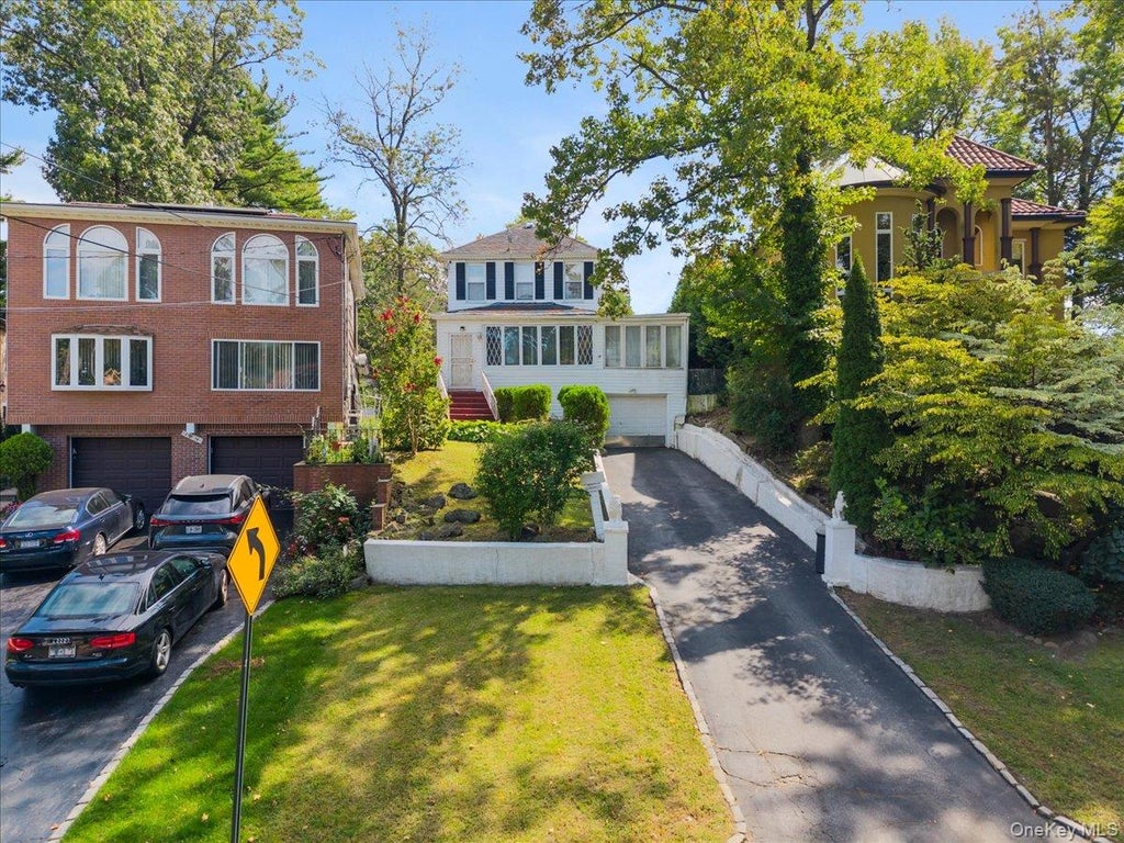 Photo of 195-12 McLaughlin Avenue, Holliswood, NY 11423 (MLS # 1053835)