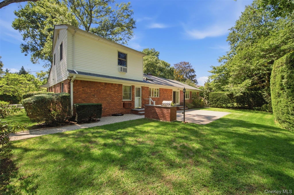 Photo of 65 Drohan Street, Huntington, NY 11743 (MLS # 1066367)