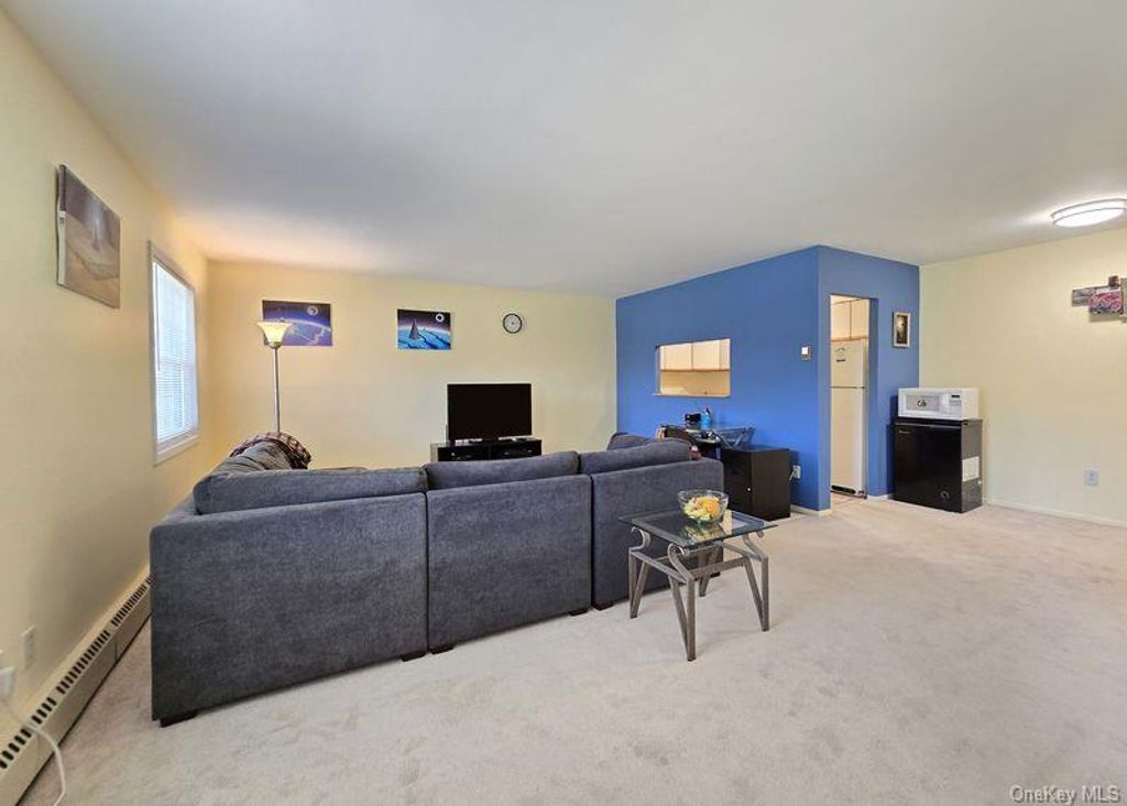 Photo of 460 Old Town Road #26M, Port Jefferson Station, NY 11776 (MLS # 986291)