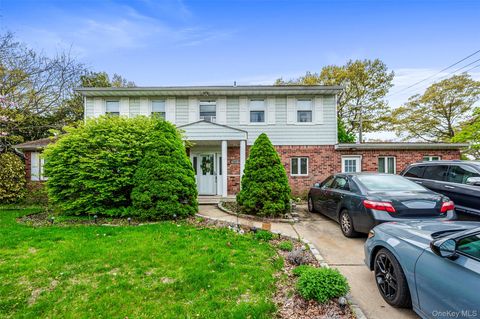 Photo of 122 Clinton Avenue, Port Jefferson Station, NY 11776 (MLS # 985948)