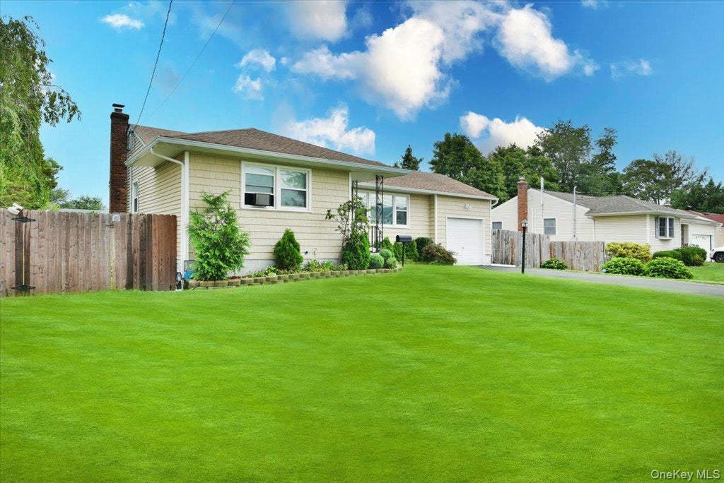 Photo of 95 Jenkins Avenue, North Babylon, NY 11703 (MLS # 1042906)