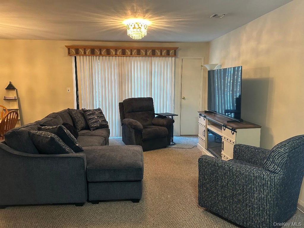 Photo of 14 Cambridge Drive W, Copiague, NY 11726 (MLS # 1067653)