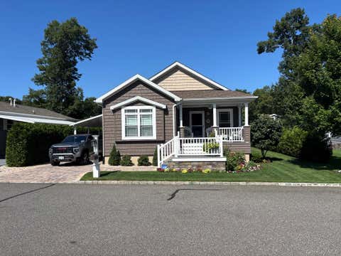 Photo of 1661 Old Country Road #567, Riverhead, NY 11901 (MLS # 1029713)