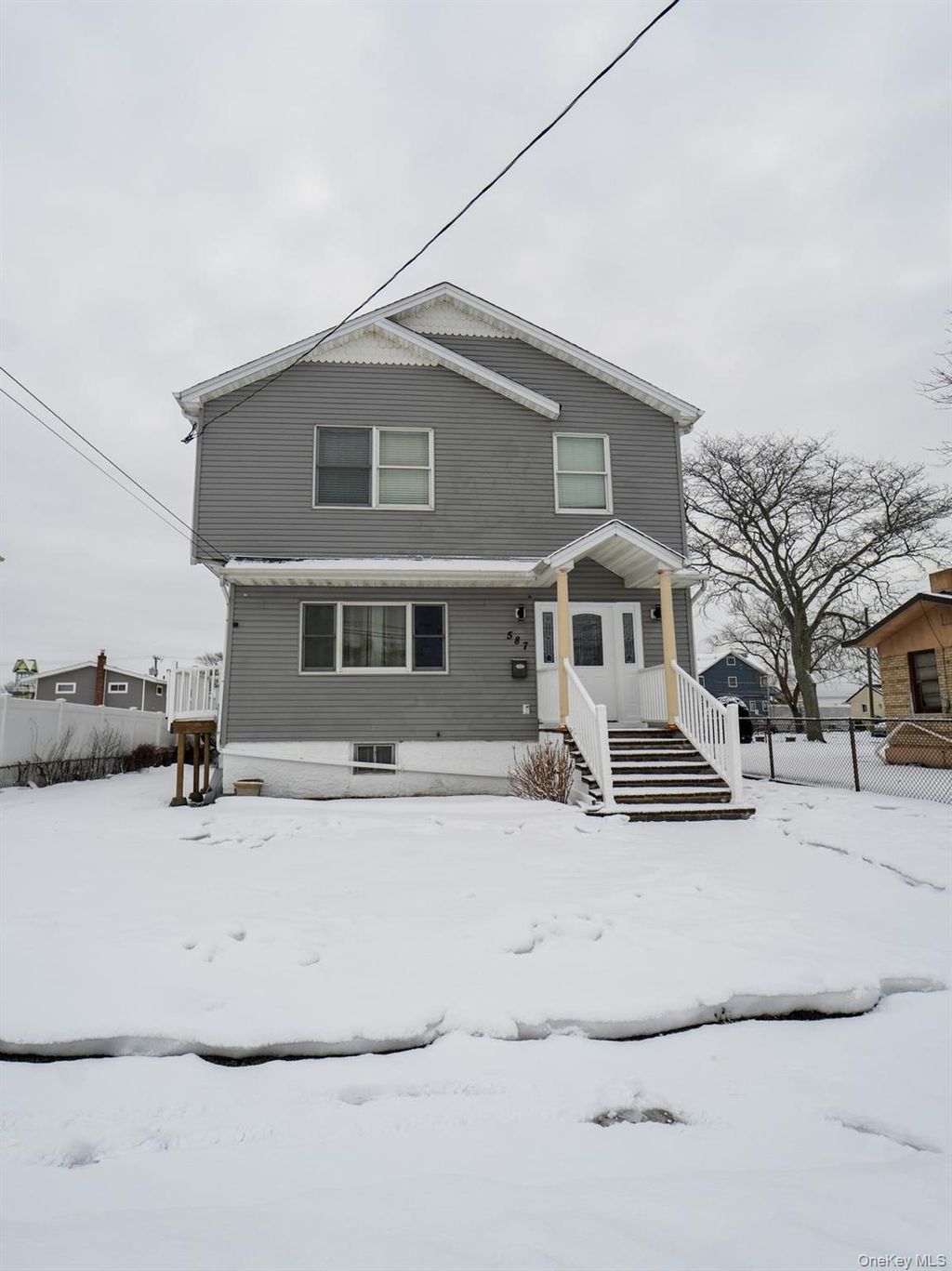 Photo of 587 Miller Avenue, Freeport, NY 11520 (MLS # 969427)