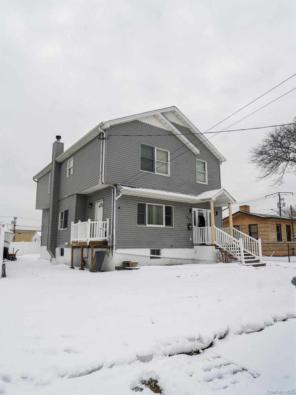 Photo of 587 Miller Avenue, Freeport, NY 11520 (MLS # 969427)