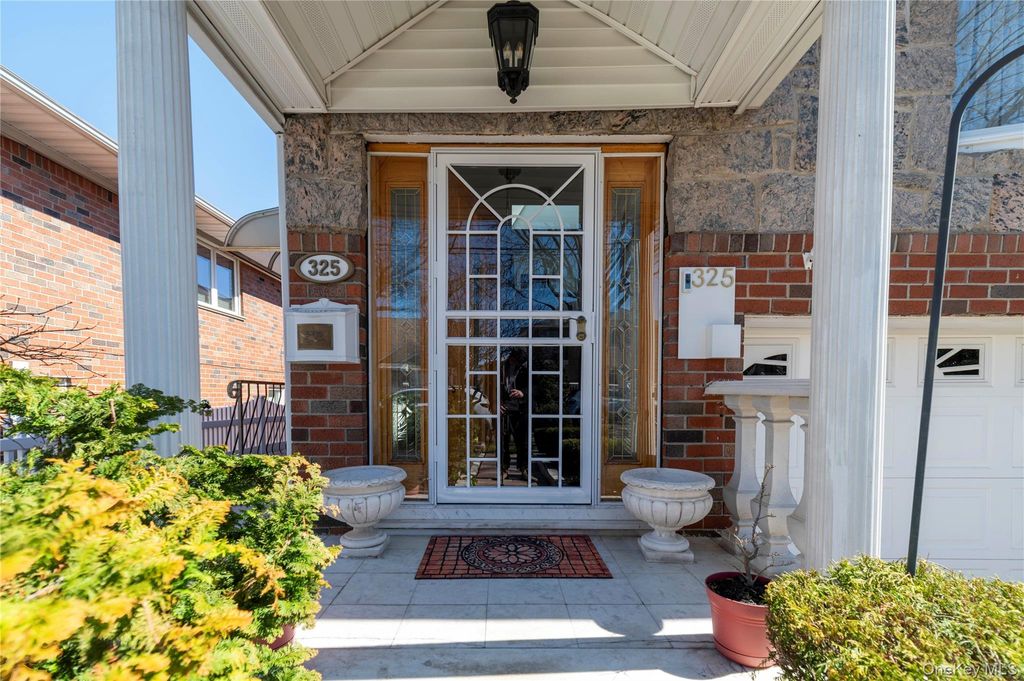 Photo of 325 149th Street, Whitestone, NY 11357 (MLS # 977306)