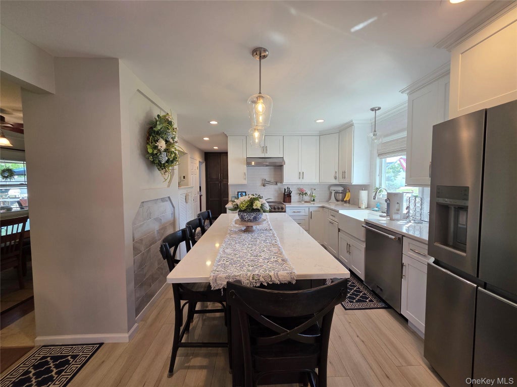 Photo of 140 Springtime Lane W, Levittown, NY 11756 (MLS # 1058030)