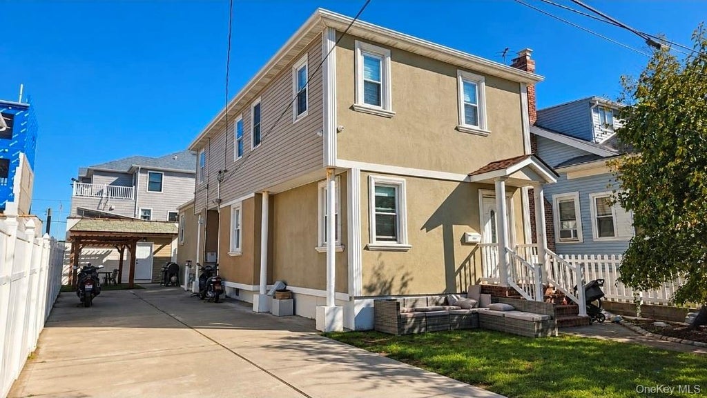 Photo of 210 Beach 3rd Street, Far Rockaway, NY 11691 (MLS # 1061635)