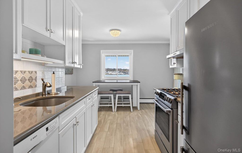 Photo of 1 Toms Point Lane #17G, Port Washington, NY 11050 (MLS # 974623)