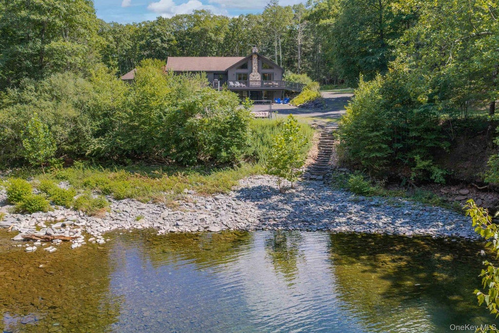 Photo of 61 Woodland Falls Road, Saugerties, NY 12477 (MLS # 1043078)
