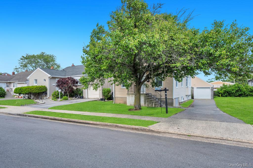 Photo of 573 Miller Avenue, Freeport, NY 11520 (MLS # 1008935)