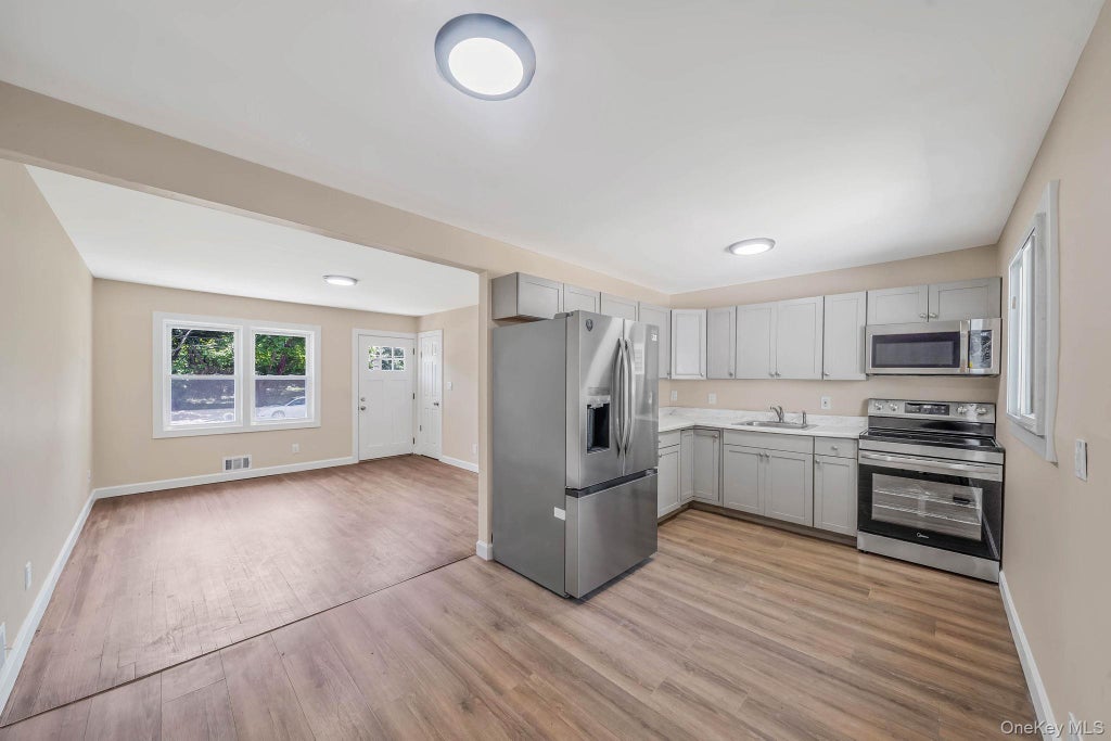 Photo of 948 Walker St AVE, Bellport, NY 11713 (MLS # 1030269)