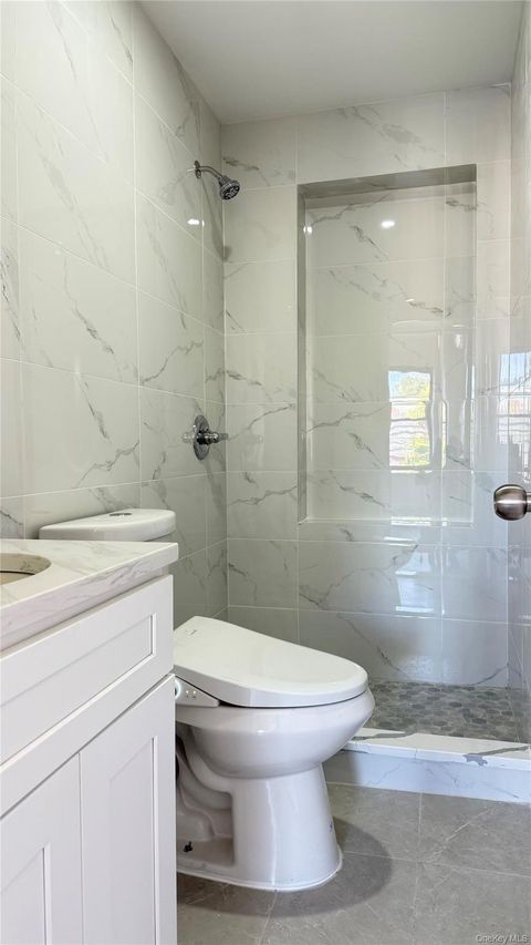 Photo of 9414 Corona ave Corona ave Ave, Elmhurst, NY 11373 (MLS # 922545)