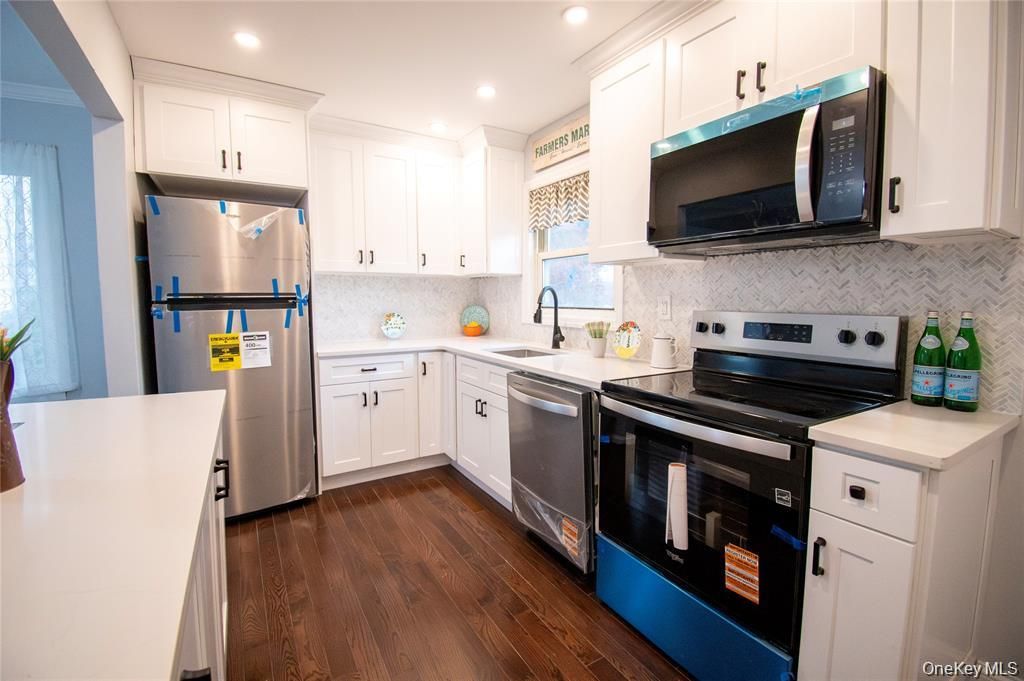 Photo of 650 Bryant Street, East Meadow, NY 11554 (MLS # 947149)