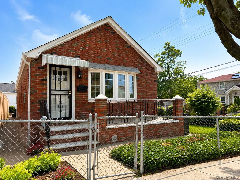 Photo of 124-02 Sutter Avenue, South Ozone Park, NY 11420 (MLS # 1028422)