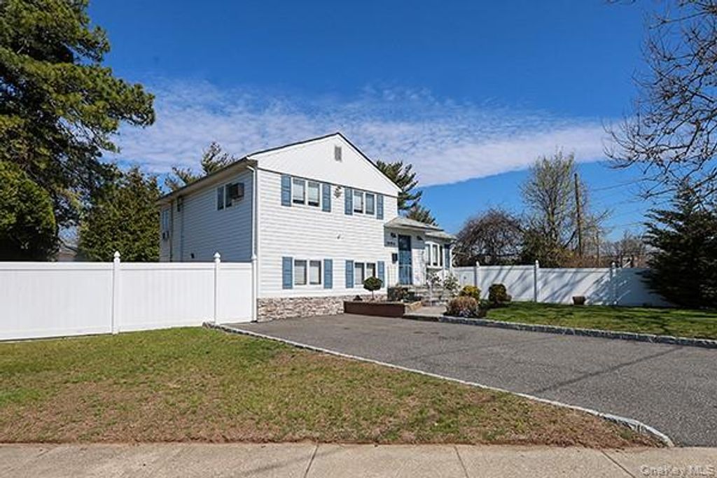 Photo of 1084 Hicksville Road, Massapequa Park, NY 11758 (MLS # 982332)