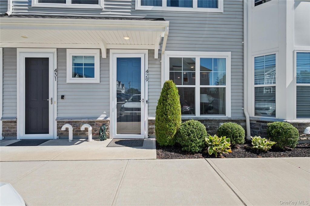 Photo of 429 Emanuel Way #429, East Meadow, NY 11554 (MLS # 909404)