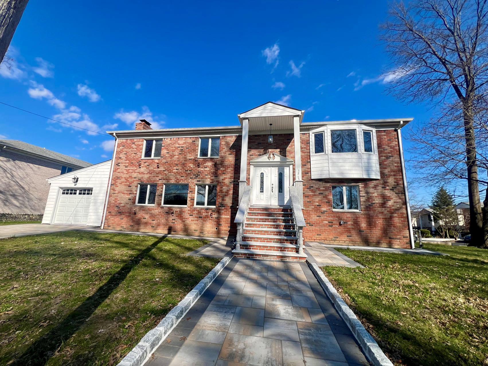210th Street, Bayside, Queens, NY - 9 Bedrooms  
7 Bathrooms  
12 Rooms - 