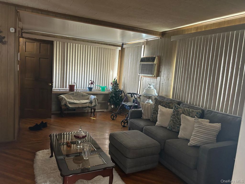 Photo of 11636 197th Street, Jamaica, NY 11412 (MLS # 1000528)