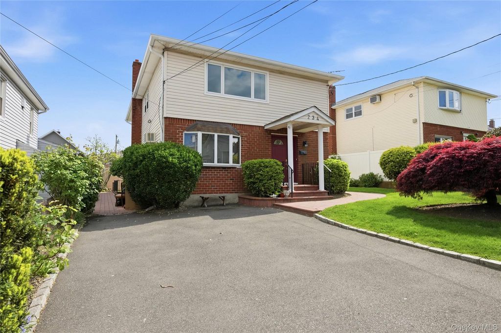 Photo of 234 Winthrop Avenue, Westbury, NY 11590 (MLS # 1000290)