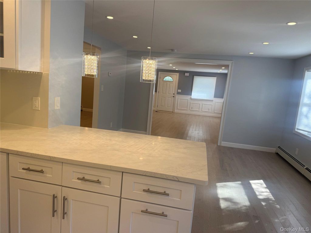 Photo of 56 Heisser Lane Ln, Farmingdale, NY 11735 (MLS # 922858)