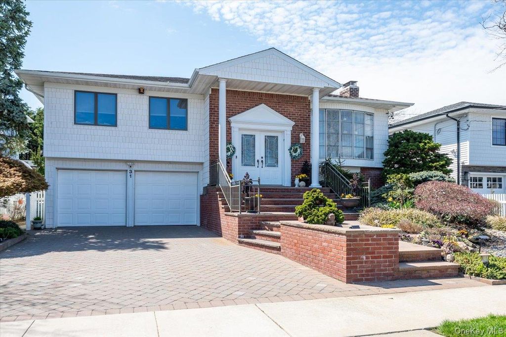 Photo of 31 Regent Drive, Lido Beach, NY 11561 (MLS # 1010626)