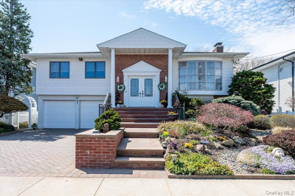 Photo of 31 Regent Drive, Lido Beach, NY 11561 (MLS # 1010626)