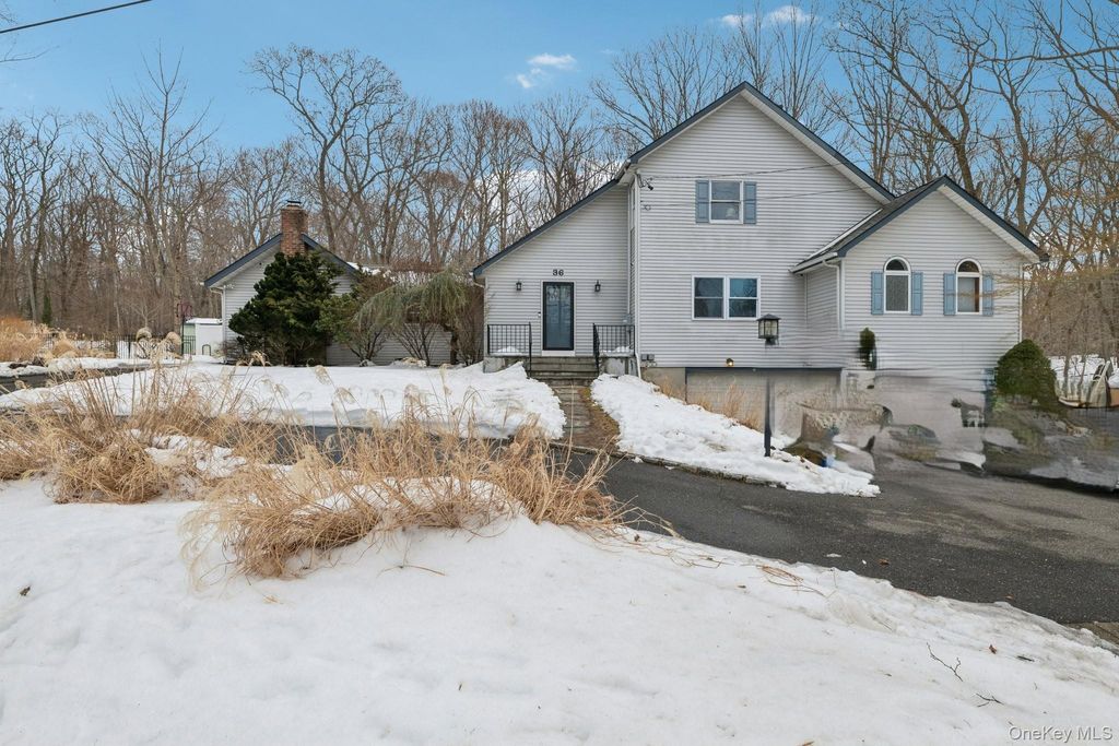 Photo of 36 Locust Avenue, Miller Place, NY 11764 (MLS # 958874)