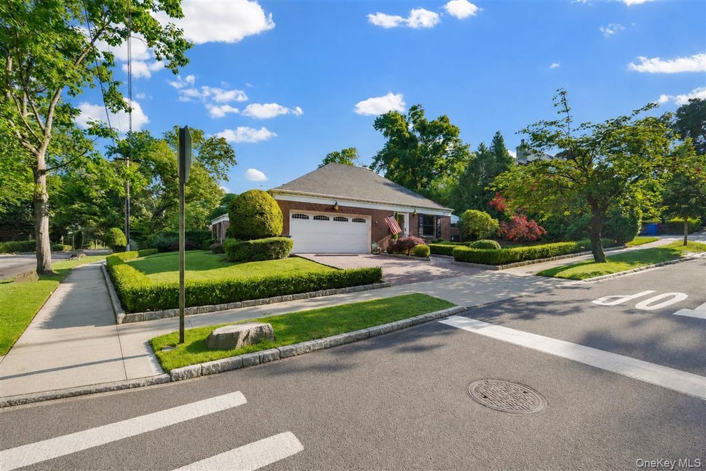 Photo of 105 Park Lane, Douglaston, NY 11363 (MLS # 1016111)