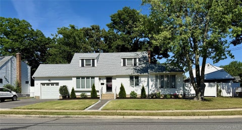 Photo of 65 Westwood Road N, Massapequa Park, NY 11762 (MLS # 1047241)