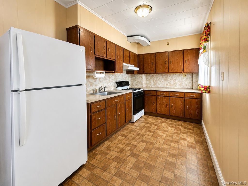 Photo of 89-46 210th Street, Queens Village, NY 11427 (MLS # 1001955)